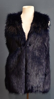 Lot 989 - ARMANI EXCHANGE; a blue fur gilet, fully lined...