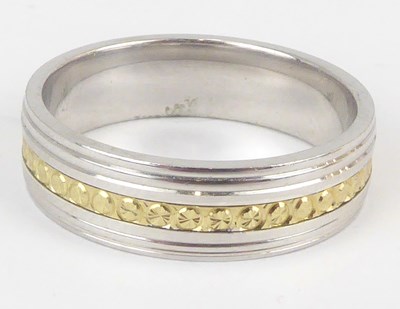 Lot 1085 - Two matching silver rings with 9ct gold central bands