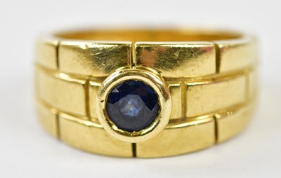 Lot 63 - CARTIER; an 18ct yellow gold and sapphire...