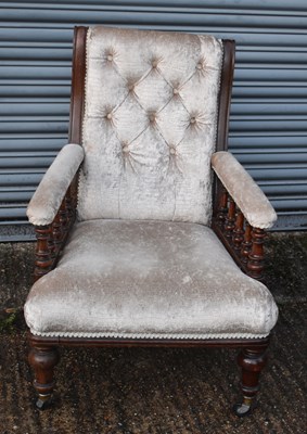 Lot 77 - A 19th century oak framed elbow chair.