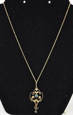Lot 789 - An early 20th century 9ct yellow gold pendant,...