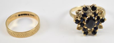 Lot 800 - A 9ct yellow gold flower head cluster ring set...