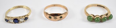 Lot 786 - A 9ct yellow gold sapphire and white stone set...