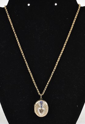 Lot 788 - A 9ct yellow gold necklace suspending a yellow...