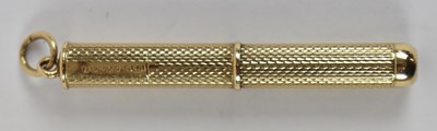 Lot 798 - A 9ct yellow gold cigar piercer, approx. 5.6g.