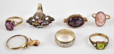 Lot 807 - A group of three yellow metal dress rings, two...