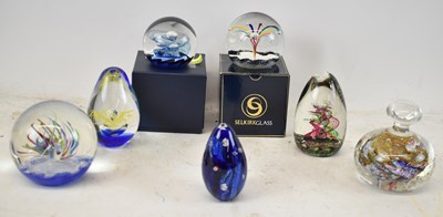 Lot 597 - A group of seven decorative paperweights...