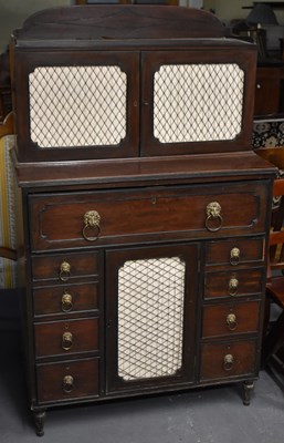 Lot 15 - A 19th century Regency style mahogany cupboard,...
