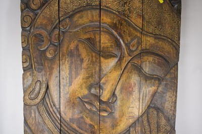 Lot 32 - A modern four-fold carved wooden screen, the...