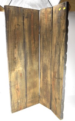 Lot 32 - A modern four-fold carved wooden screen, the...