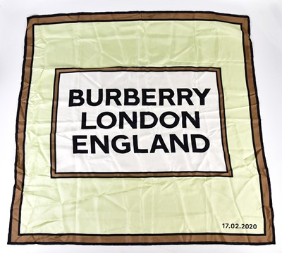 Lot 945 - BURBERRY; a mint green, brown and black 100%...