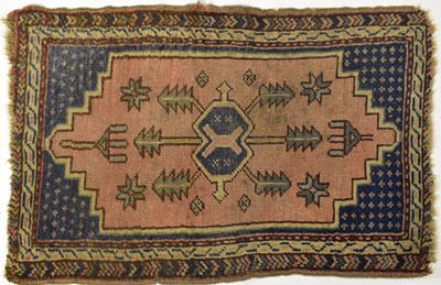 Lot 82 - A Turkish wool prayer rug in red, blue, brown...
