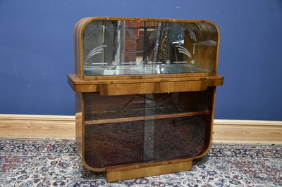 Lot 6717 - An Art Deco walnut cocktail/display cabinet,...