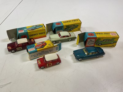 Lot 84 - CORGI; four cars, comprising a 238 Jaguar Mkx...