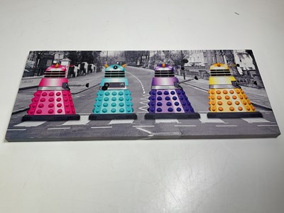 Lot 81 - Two boxed 14" remote control toy Daleks in...