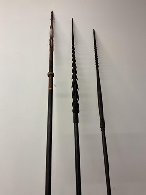 Lot 27 - Three carved Solomon Islands Spears, bought by...