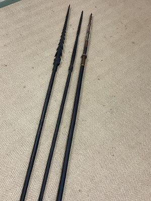 Lot 27 - Three carved Solomon Islands Spears, bought by...