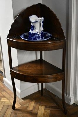 Lot 6664 - A 19th century mahogany corner washstand, with...