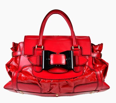 Lot 877 - GUCCI; a red leather and coated canvas medium...
