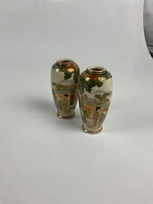Lot 5335 - A pair of Japanese Satsuma vases, each...
