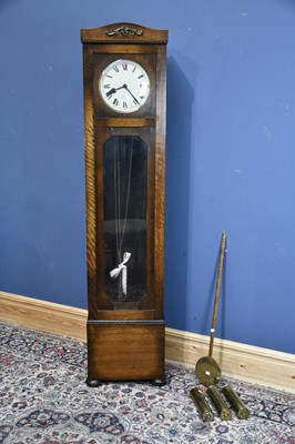 Lot 6454 - A 1930s oak cased Westminster chime long case...