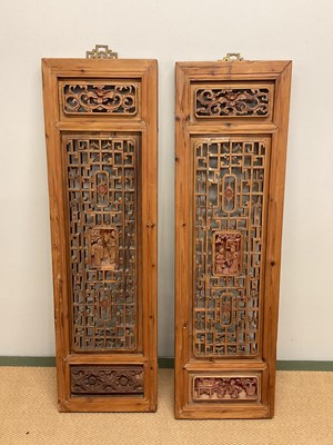 Lot 126 - A pair of decorative carved oriental wooden...