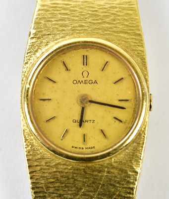 Lot 2859 - OMEGA; a lady's vintage 18ct yellow gold...