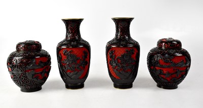 Lot 445 - A pair of Oriental cinnabar vases