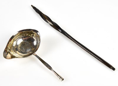 Lot 2670 - A George III coin set toddy ladle with...