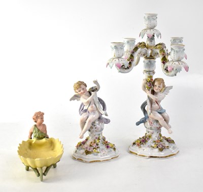 Lot 250 - A 19th century Dresden porcelain four-branch candelabrum