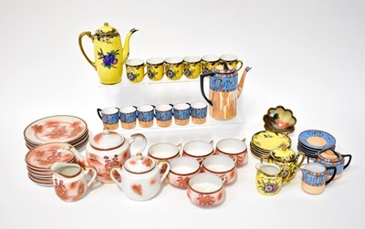 Lot 385 - A Japanese geisha eggshell tea set