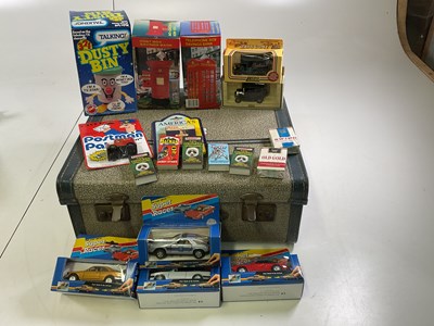 Lot 44 - A suitcase containing a Dusty Bin money box...