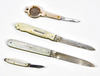Lot 2715 - Two mother of pearl bodied silver bladed fruit...