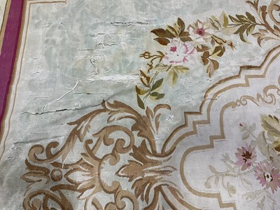 Lot 99 - An early 20th century tapestry floor covering...