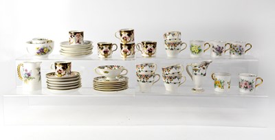 Lot 233 - Three porcelain part coffee sets