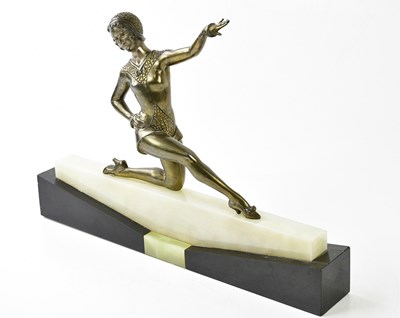 Lot 2079 - An Art Deco silvered metal figure on onyx base,...