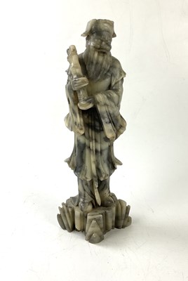 Lot 5337 - A modern Chinese carved soapstone figure,...