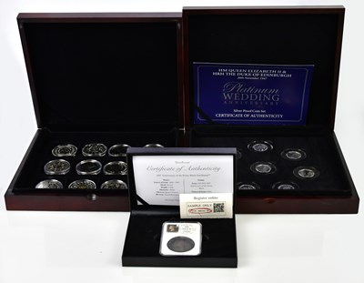 Lot 3183 - A cased set of eight silver proof 50p pieces,...