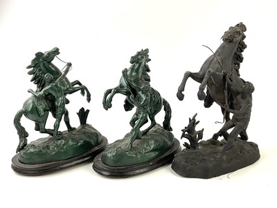 Lot 5160 - A pair of green painted spelter figures of...