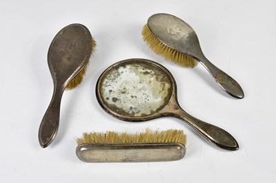 Lot 2657 - A George V hallmarked silver three piece...