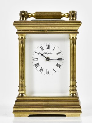 Lot 6391 - ANGELUS; a miniature brass cased carriage...