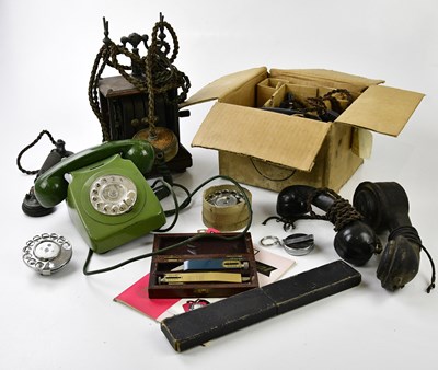 Lot 5059 - A vintage wooden telephone, with a green...