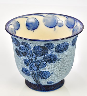 Lot 5512 - WILLIAM MOORCROFT; a footed Florian Ware vase...