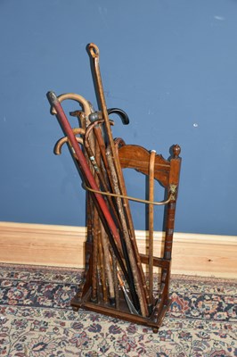 Lot 6666 - A Victorian oak stick stand containing a...