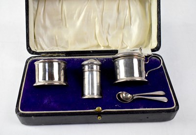 Lot 664 - A cased George V hallmarked silver three-piece cruet