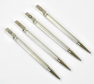 Lot 2646 - A cased set of four sterling silver bridge...