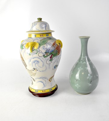 Lot 376 - A celadon-style crackle glaze vase of onion form