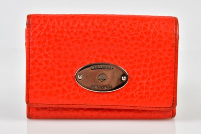 Lot 935 - MULBERRY; a textured thick orange leather...