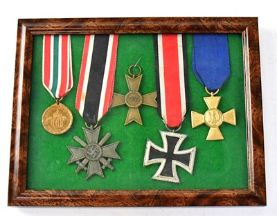 Lot 604 - A group of WWII Third Reich medals comprising...