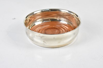 Lot 2662 - TIFFANY & CO; a sterling silver bottle stand...